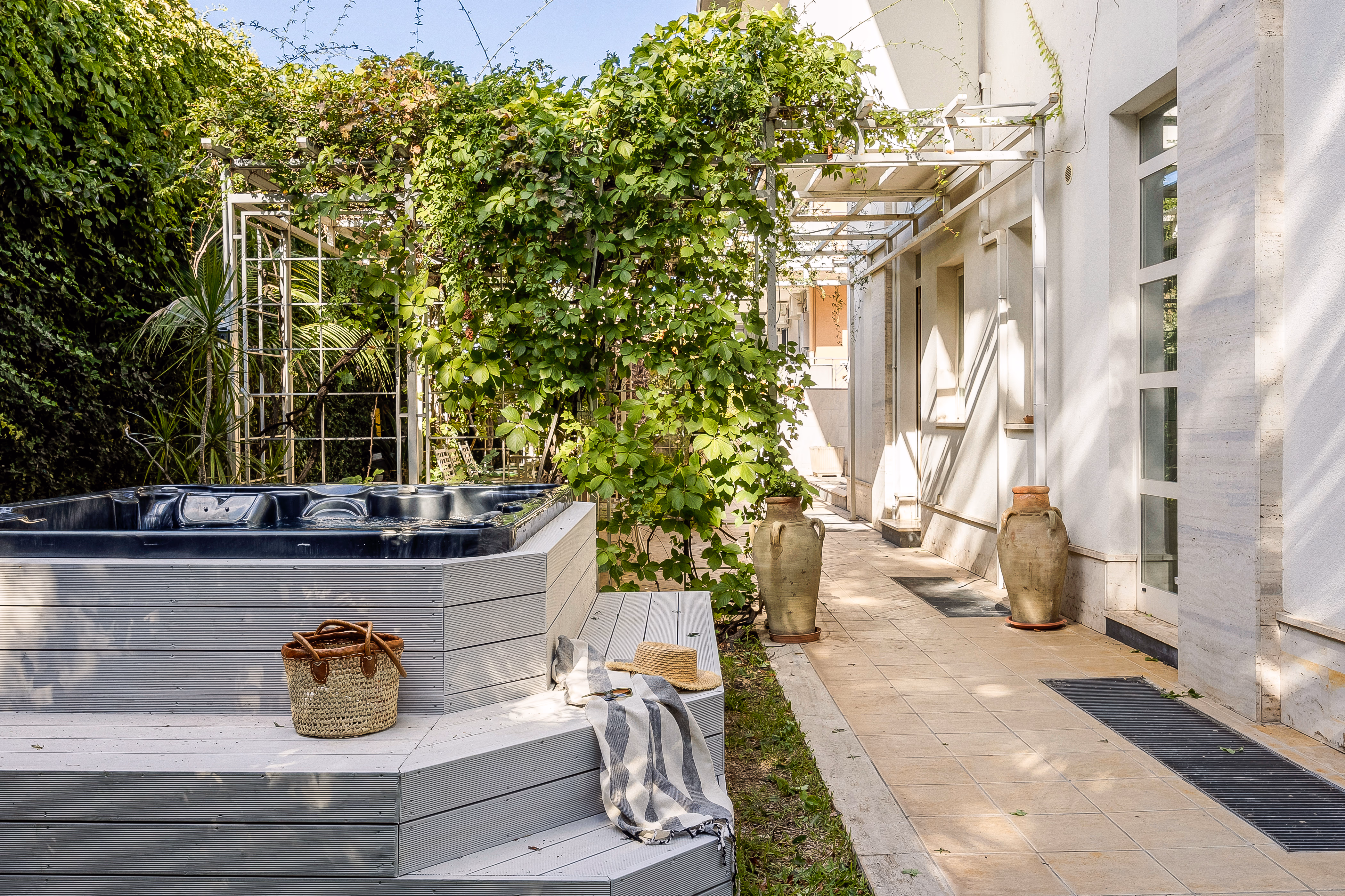 Garden, pergola, and outdoor jacuzzi