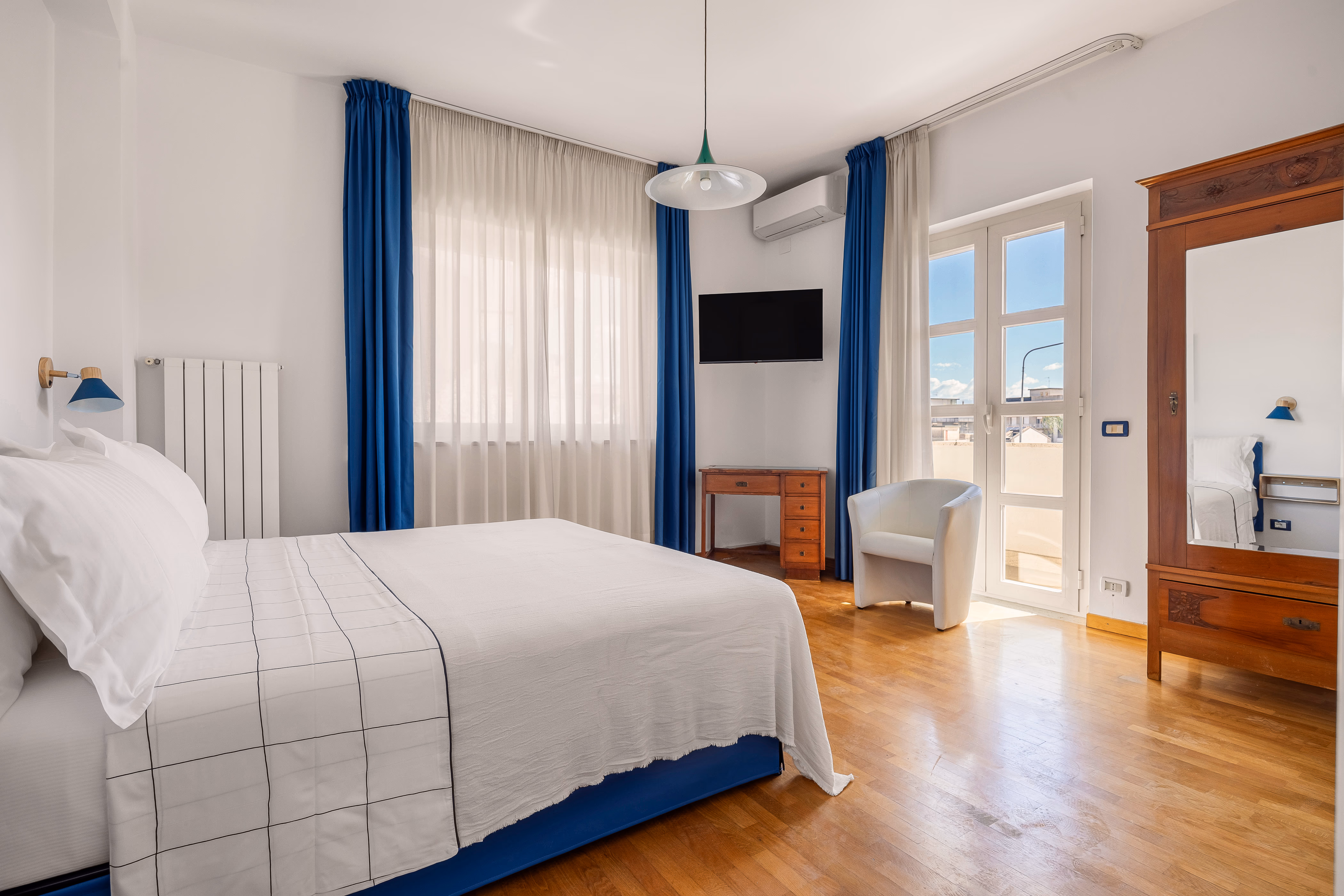 Bedroom with natural light and calm atmosphere